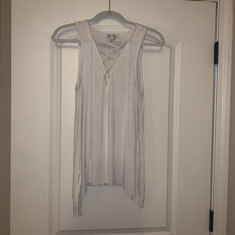 Flowy white tank top with lace up v-neck